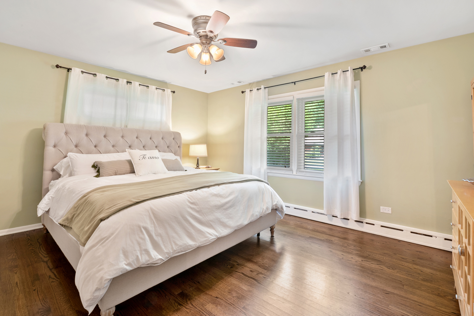 1136 Waveland Road Lake Forest, IL 60045 - Photo 11 of 18 a bedroom with a large bed and a window