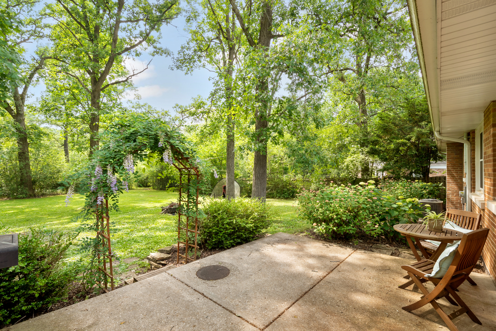 1136 Waveland Road Lake Forest, IL 60045 - Photo 18 of 18 a view of a backyard with sitting area