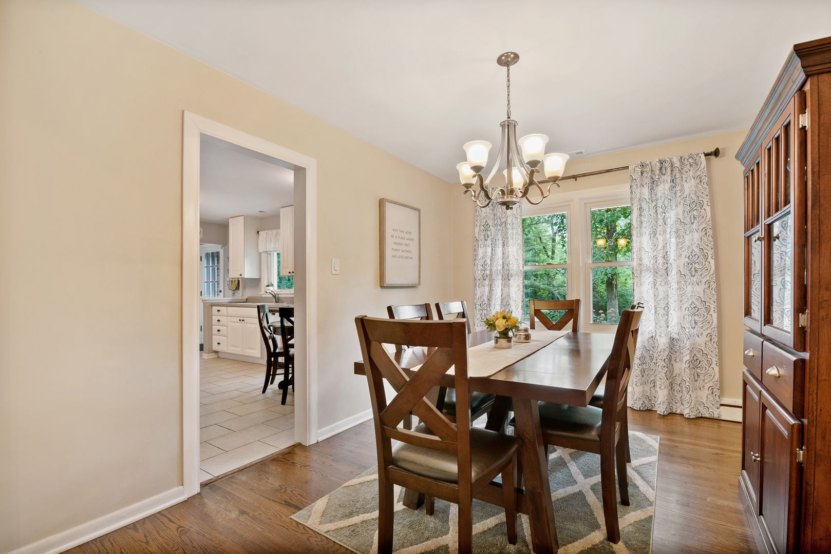 1136 Waveland Road Lake Forest, IL 60045 - Photo 6 of 18 a view of a dining room with furniture window and wooden floor