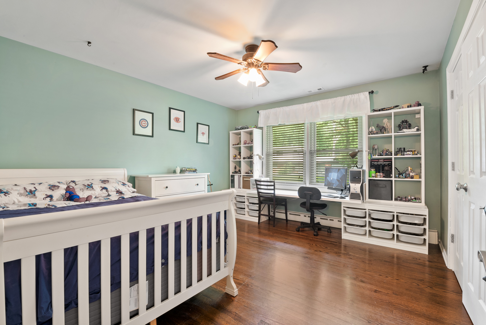 1136 Waveland Road Lake Forest, IL 60045 - Photo 9 of 18 a bedroom with furniture and wooden floor