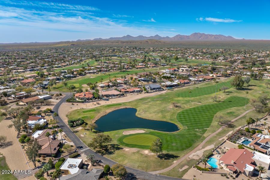 19049 East Poco Rio Drive Rio Verde, AZ 85263 - Photo 8 of 37 an aerial view of a residential houses with outdoor space