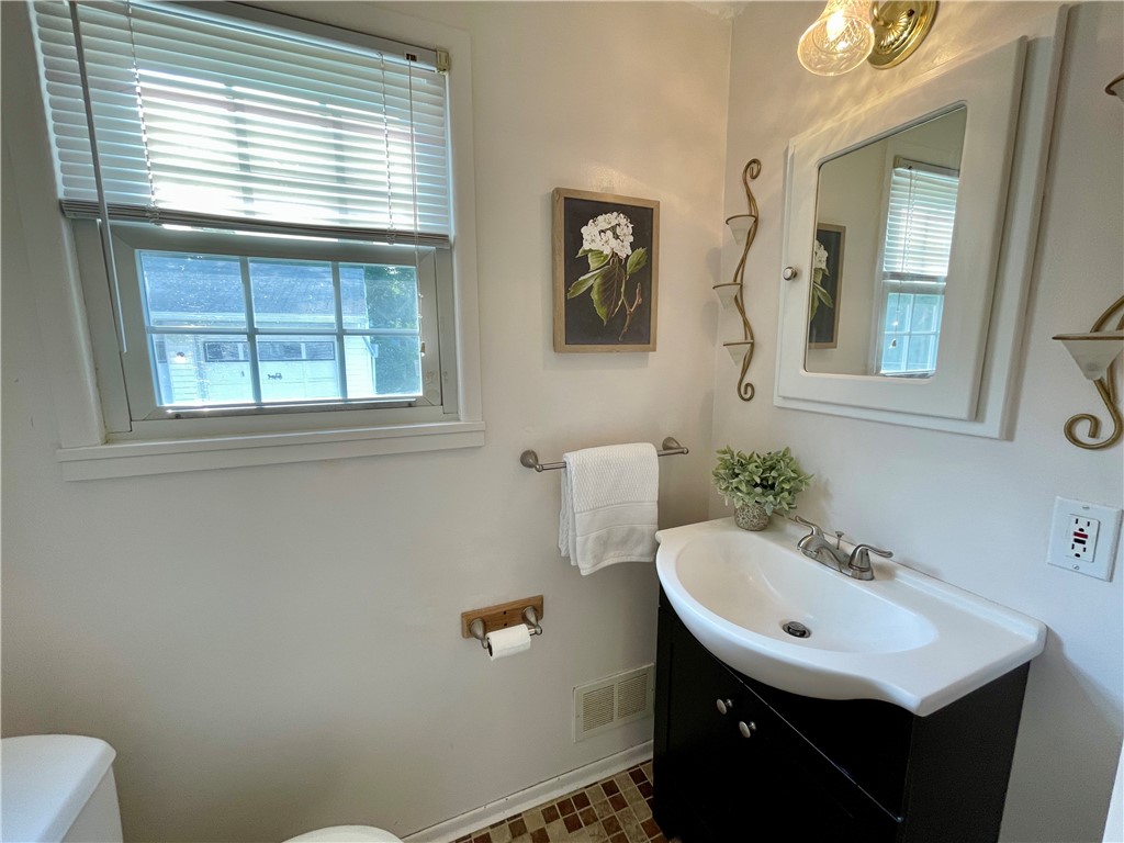 93 Armstrong Road Greece, NY 14616 - Photo 16 of 26 Half Bath on first level.