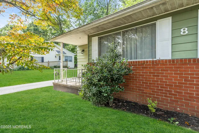 a view of a back yard of the house