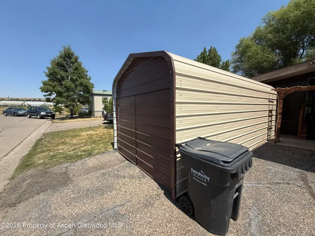 a view of a backyard of the house