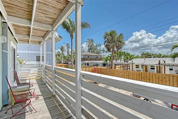 a view of a balcony with city view