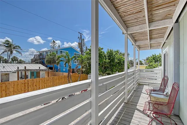 a view of balcony with a potted plant