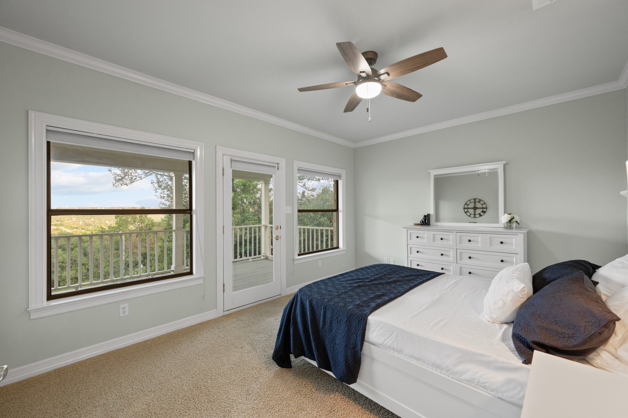 6004 Mt Bonnell Road Austin, TX 78731 - Photo 21 of 24 a bedroom with a large bed and a window