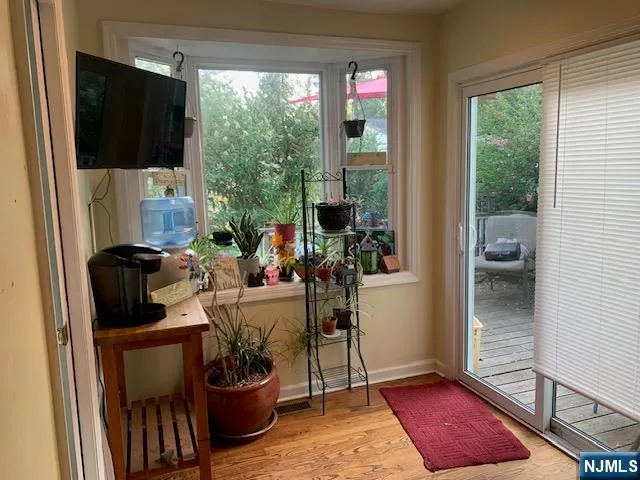 a view of a living room and dining room