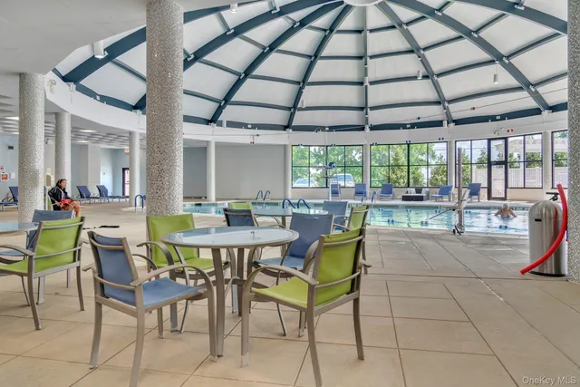 a view of street with wooden fence