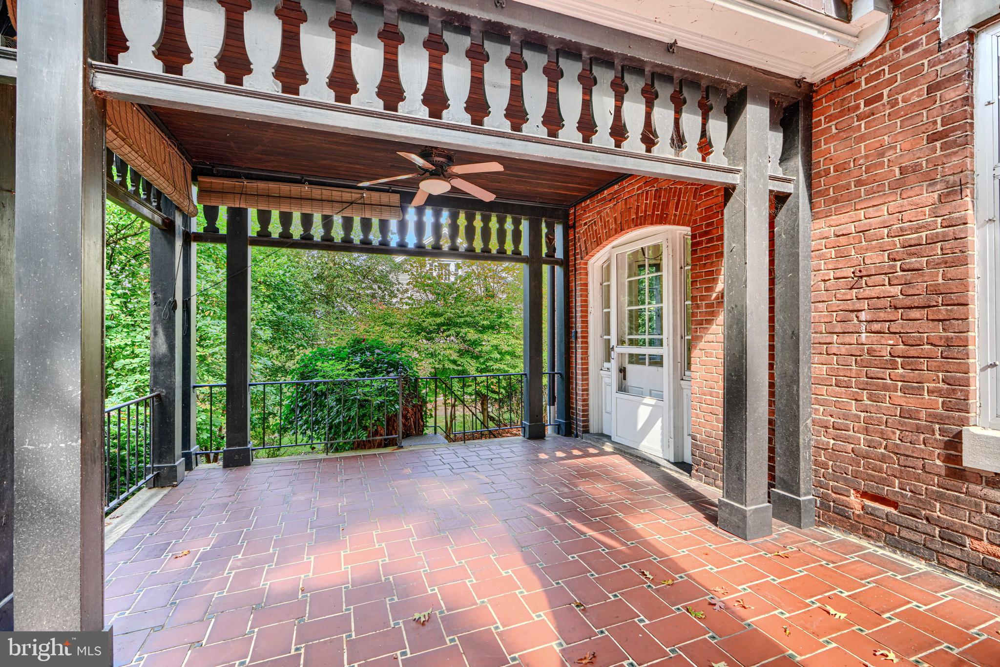 210 Ridgewood Road Baltimore, MD 21210 - Photo 54 of 84 a front view of a house with a porch