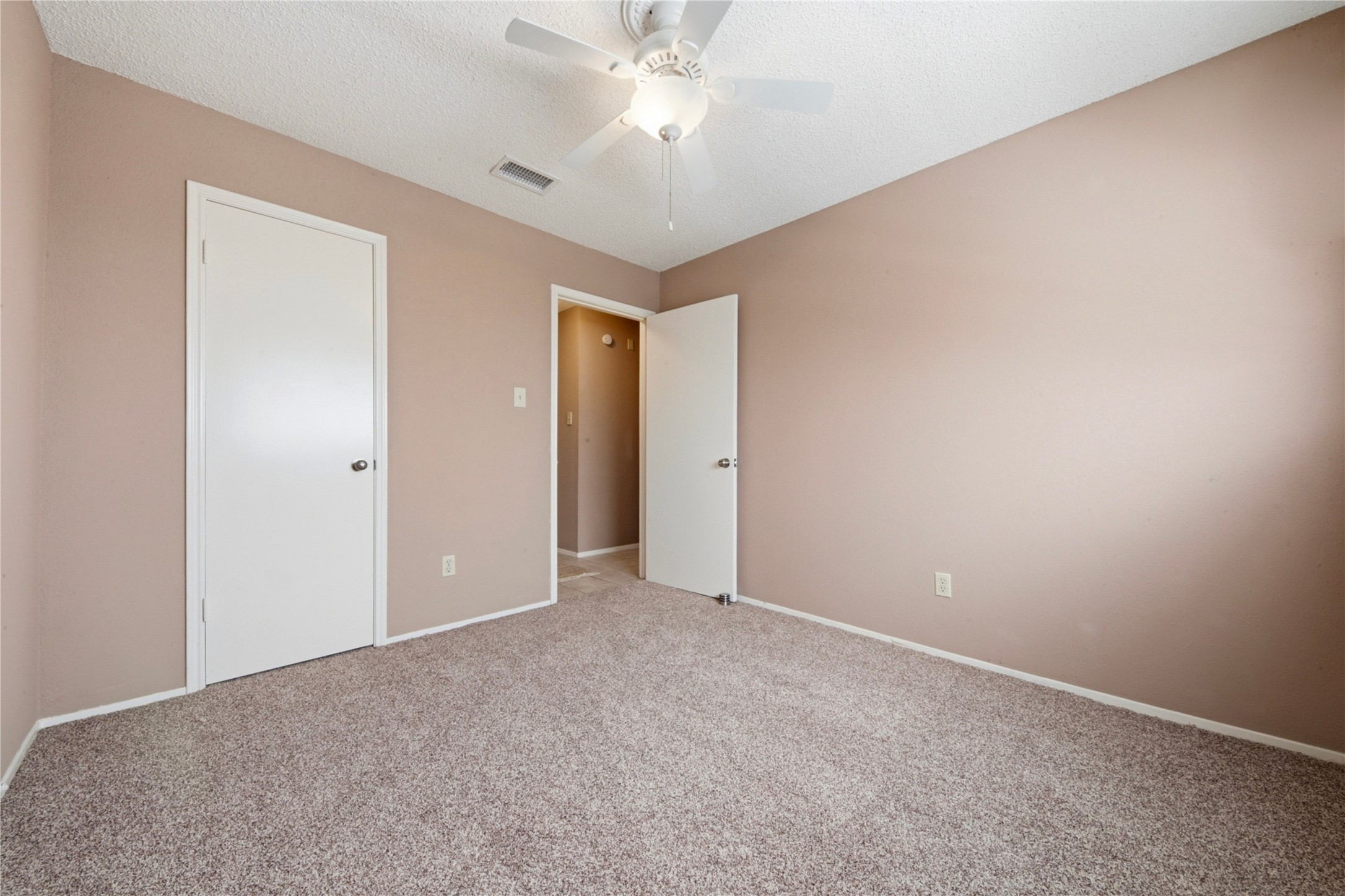 4019 Postwood Drive Spring, TX 77388 - Photo 21 of 50 a view of an empty room and chandelier fan