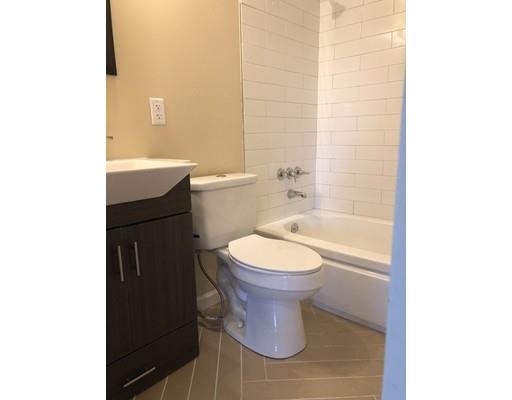 198 Treetop Avenue Springfield, MA 01118 - Photo 23 of 26 a bathroom with a toilet a sink and bathtub