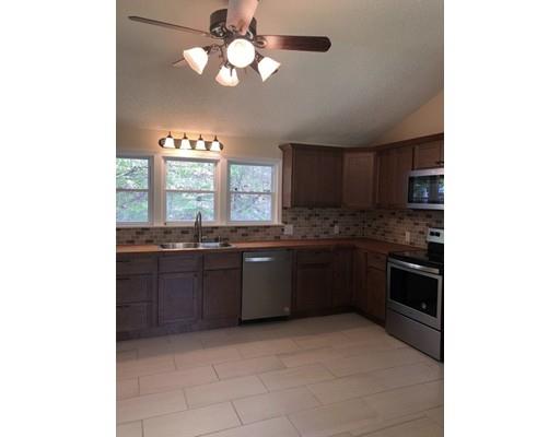 198 Treetop Avenue Springfield, MA 01118 - Photo 4 of 26 a kitchen with a sink cabinets and window