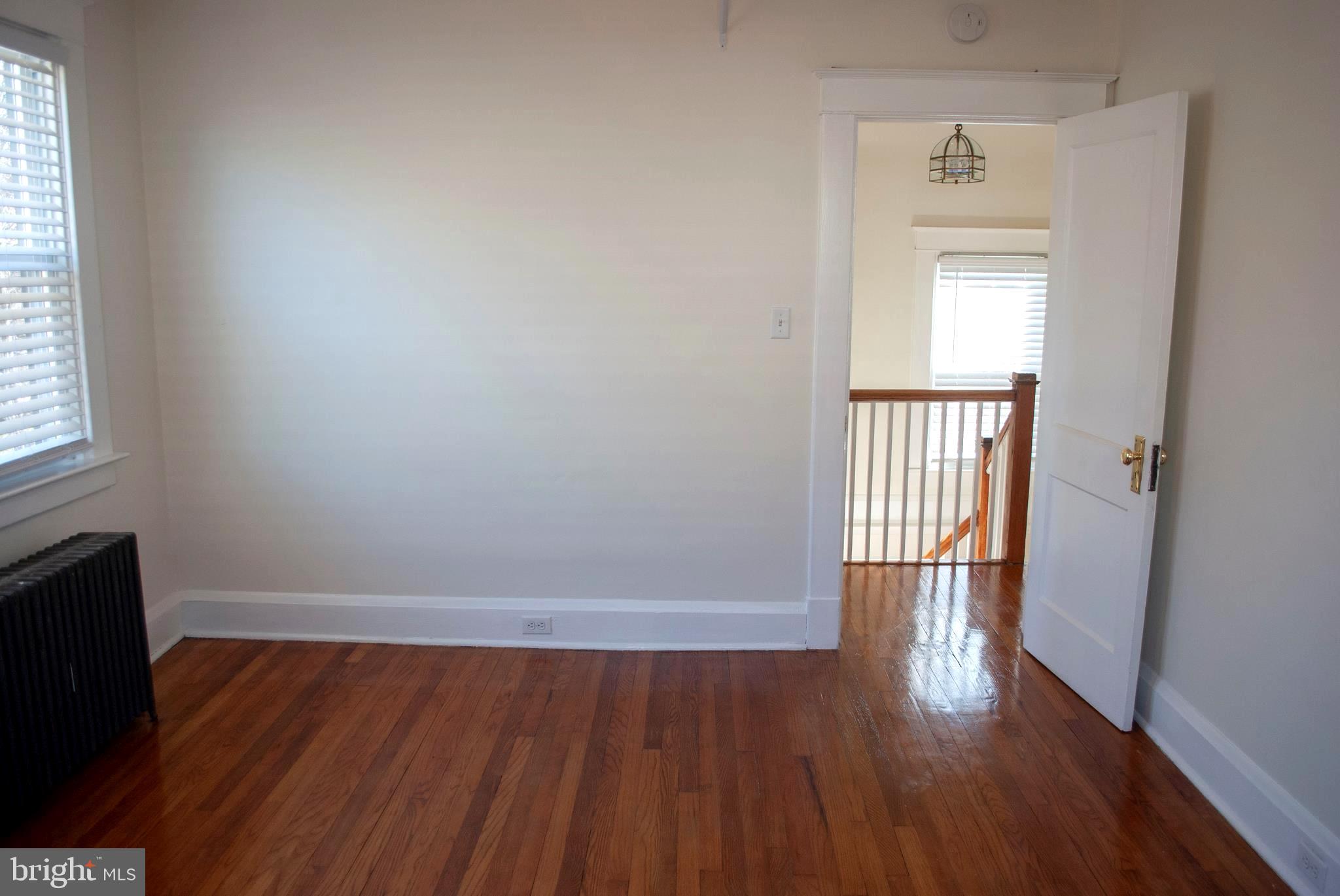 416 Westgate Road Baltimore, MD 21229 - Photo 29 of 44 Hardwood Floors in Master Bedroom