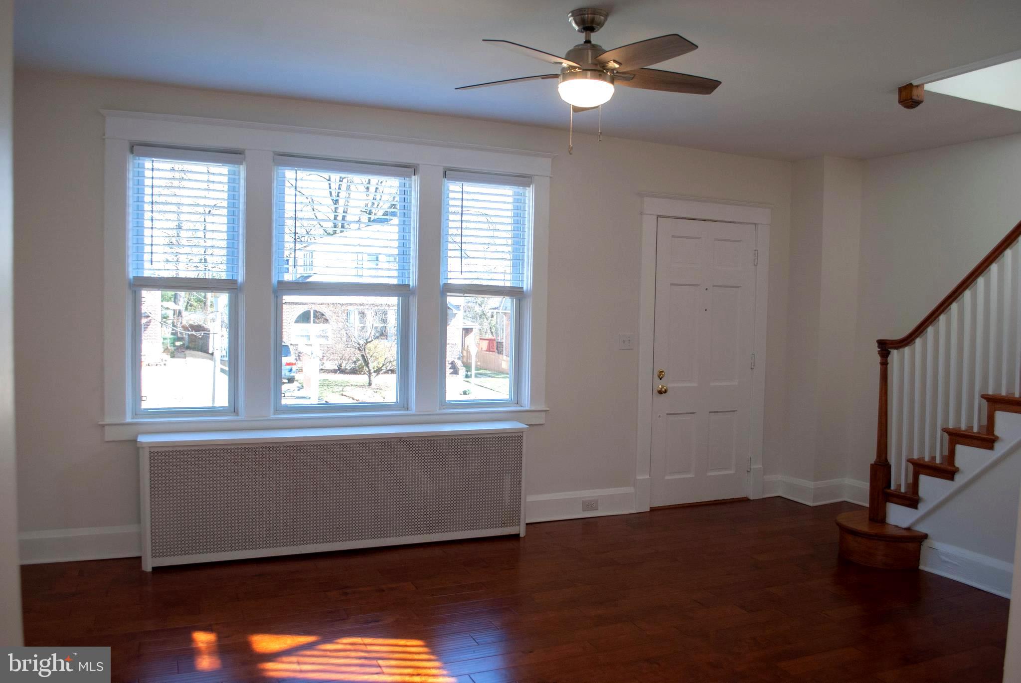 416 Westgate Road Baltimore, MD 21229 - Photo 5 of 44 Ceiling Fan and Lots of Windows in Living Room