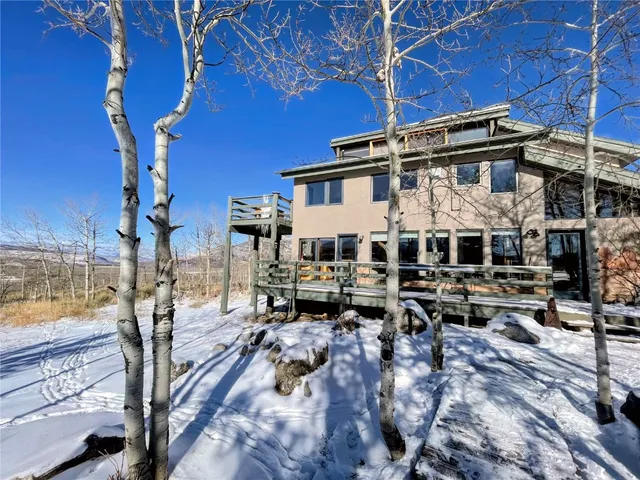 a view of a building with sitting area