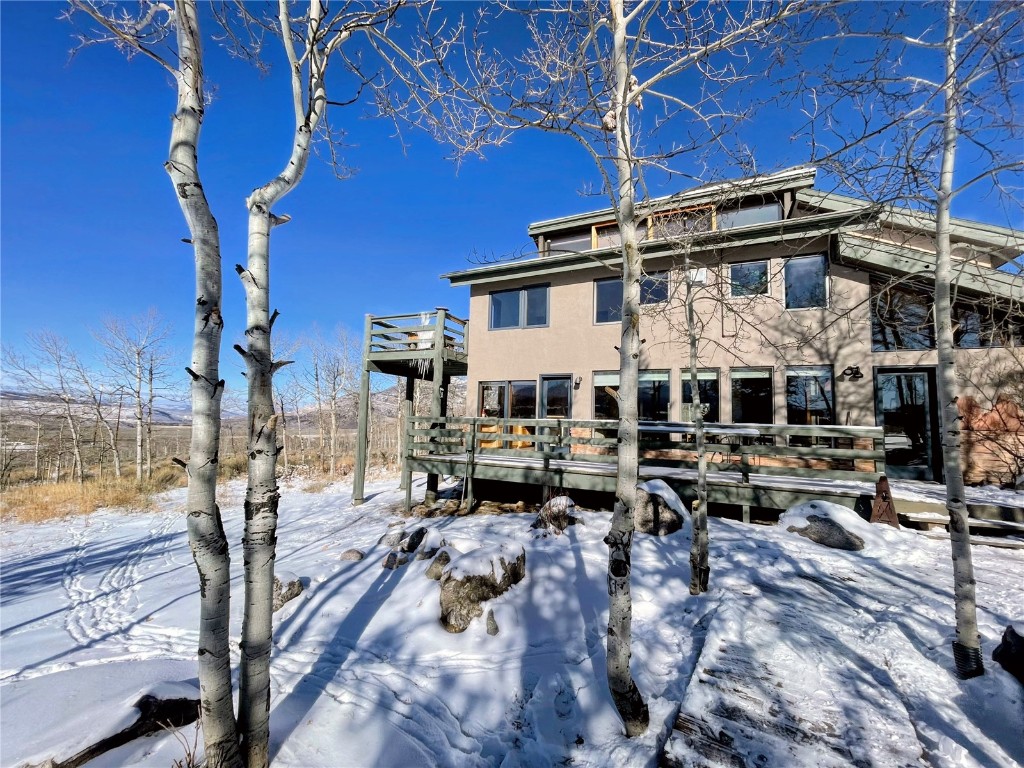 a view of a building with sitting area