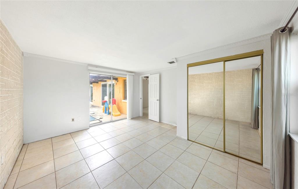 3105 Pinon Drive Holiday, FL 34691 - Photo 15 of 23 a view of an empty room with window