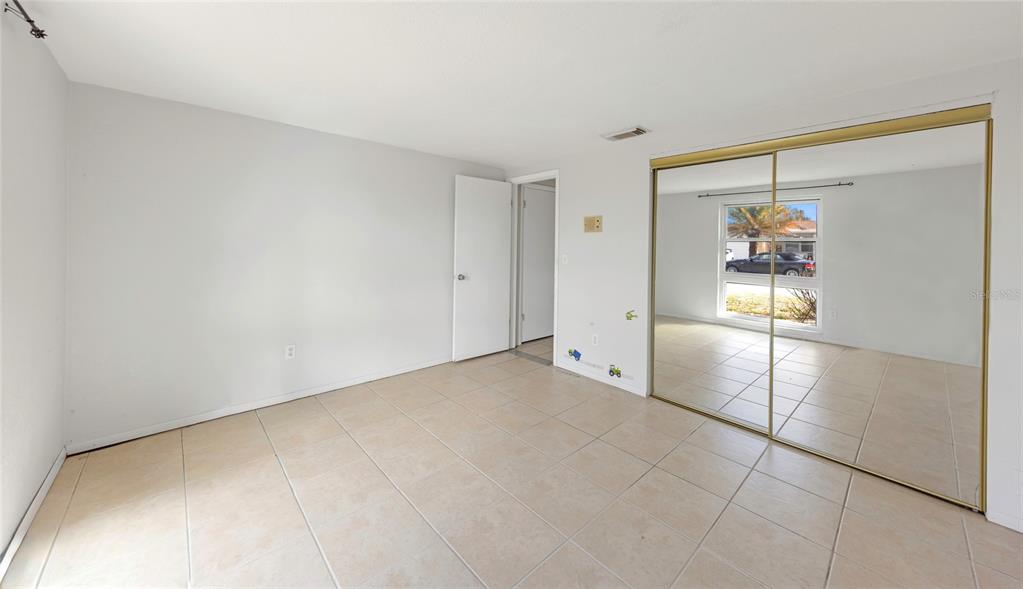 3105 Pinon Drive Holiday, FL 34691 - Photo 19 of 23 a view of an empty room with window