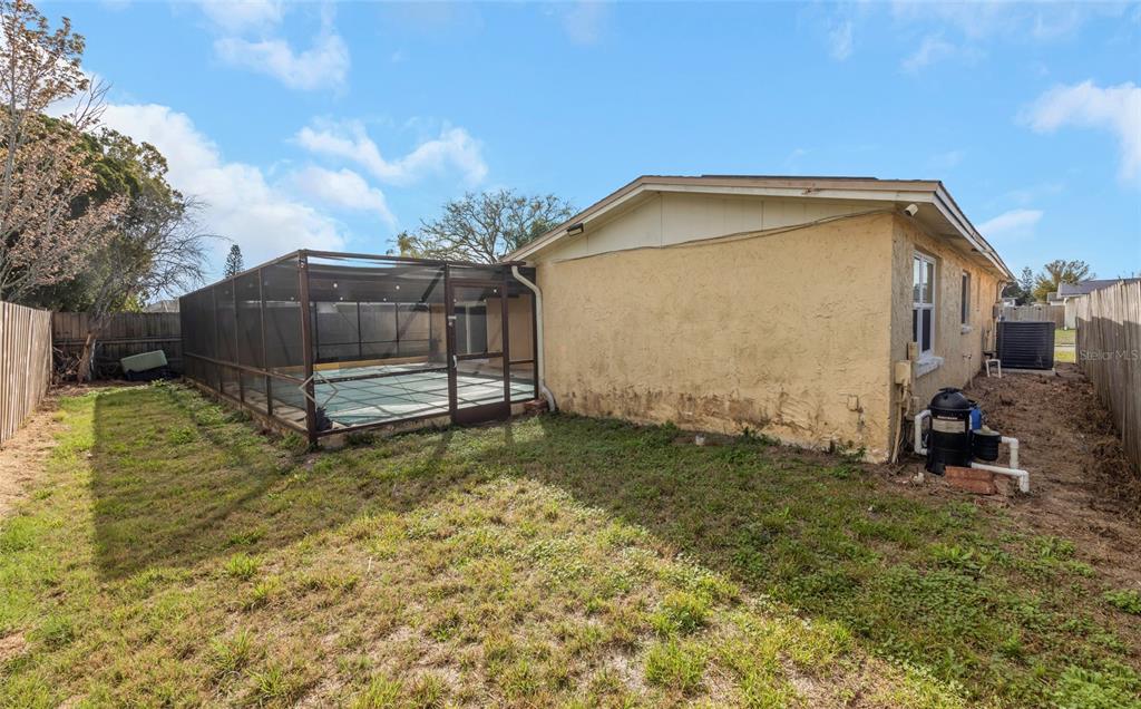 3105 Pinon Drive Holiday, FL 34691 - Photo 23 of 23 a view of a house with a yard