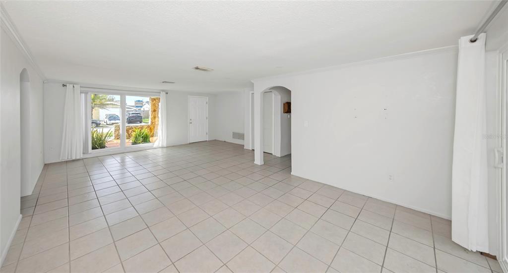 3105 Pinon Drive Holiday, FL 34691 - Photo 5 of 23 an empty room with windows