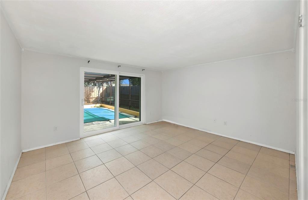 3105 Pinon Drive Holiday, FL 34691 - Photo 10 of 23 a view of an empty room with a window