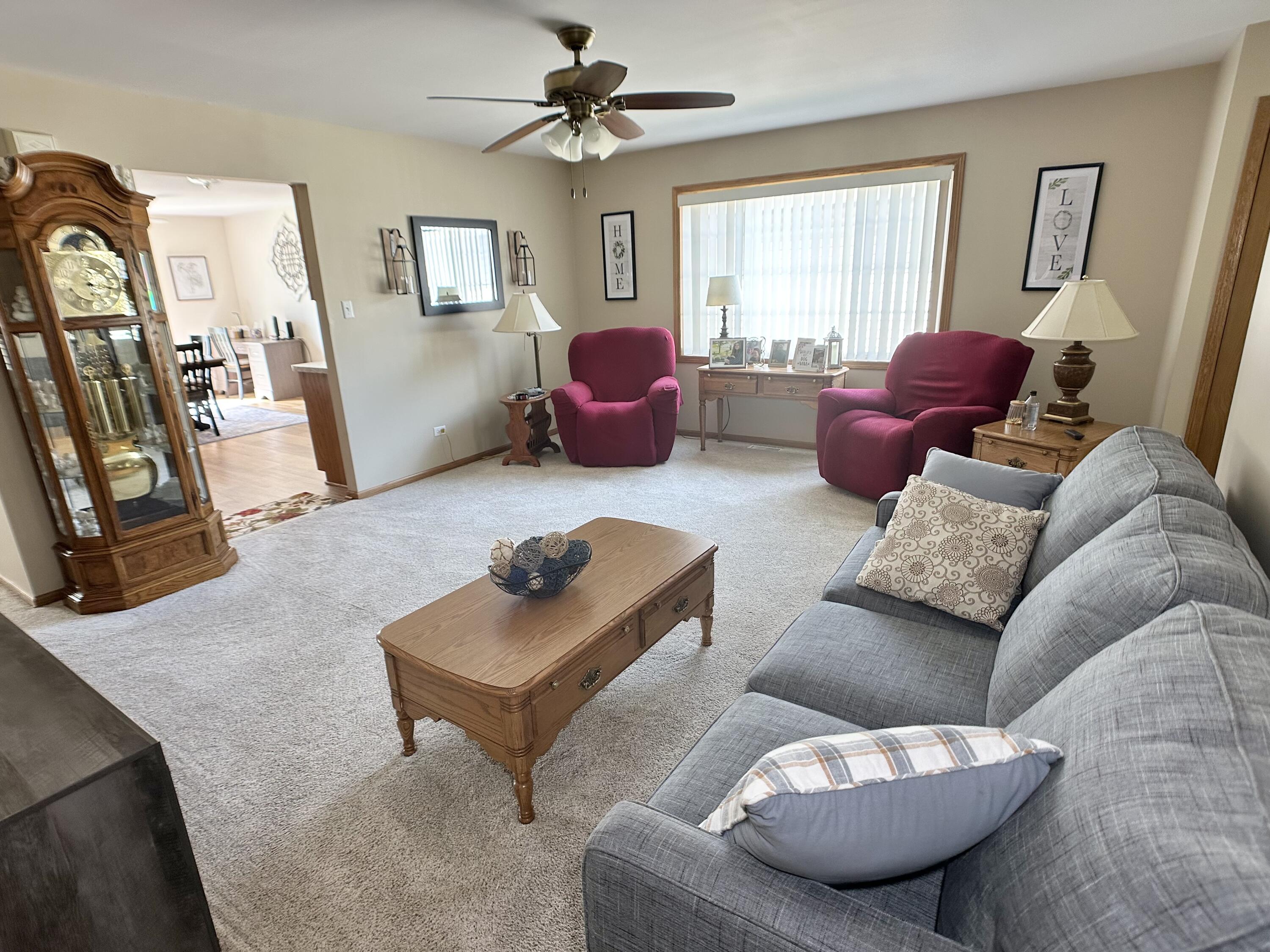 9748 Erie Street Highland, IN 46322 - Photo 4 of 14 a living room with furniture and a window