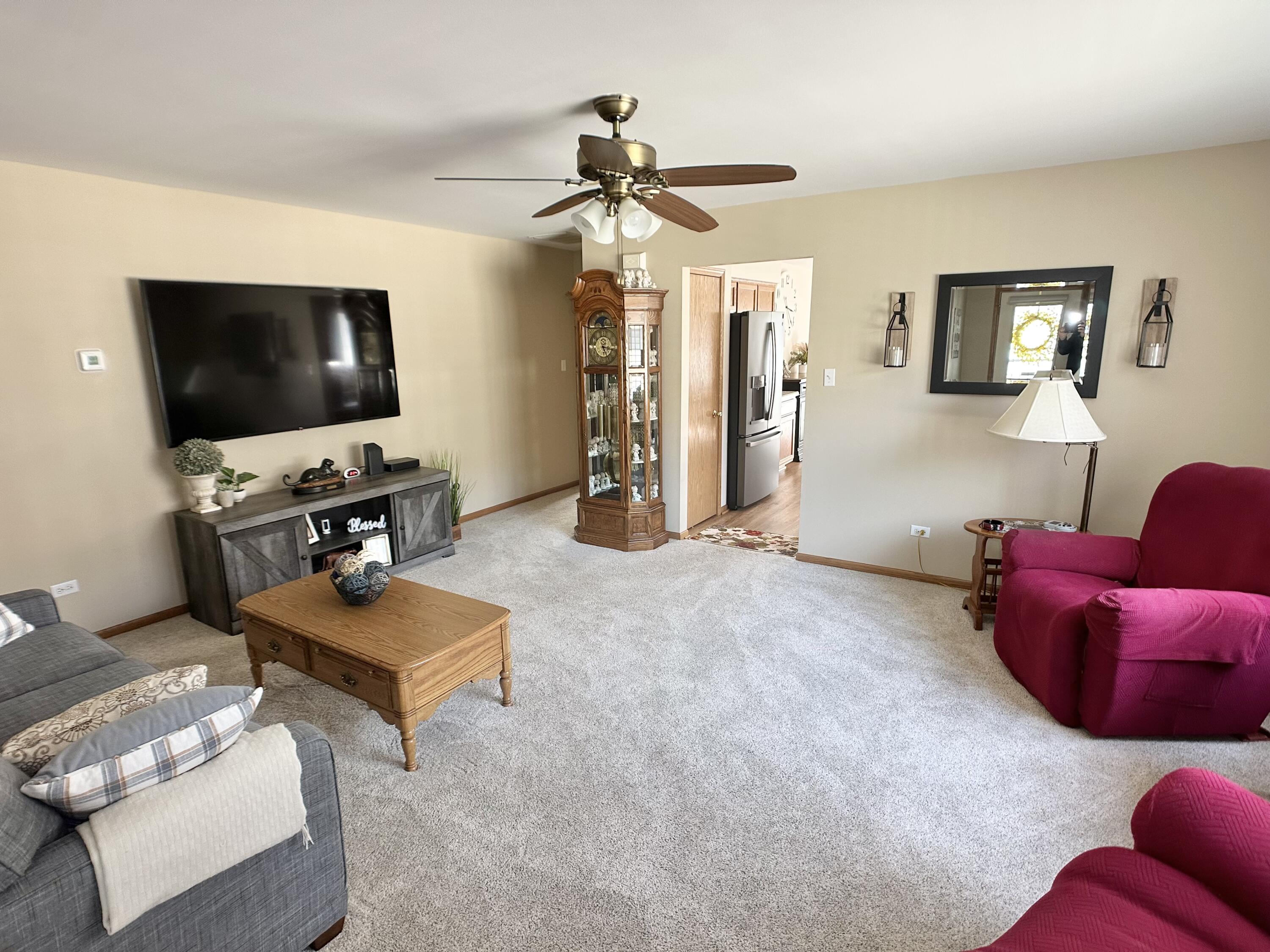 9748 Erie Street Highland, IN 46322 - Photo 5 of 14 a living room with furniture and a flat screen tv