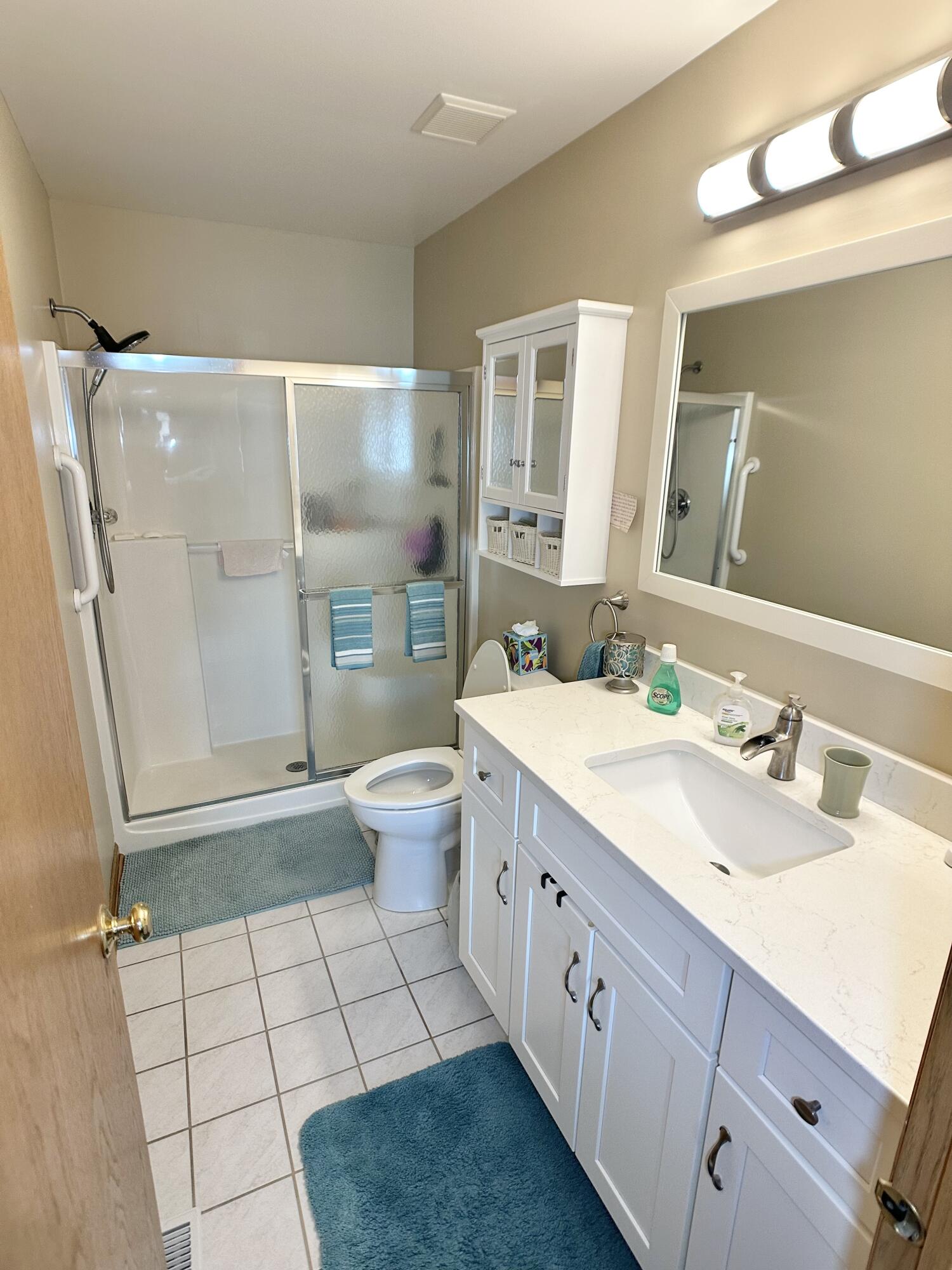 9748 Erie Street Highland, IN 46322 - Photo 8 of 14 a bathroom with a double vanity sink mirror and toilet
