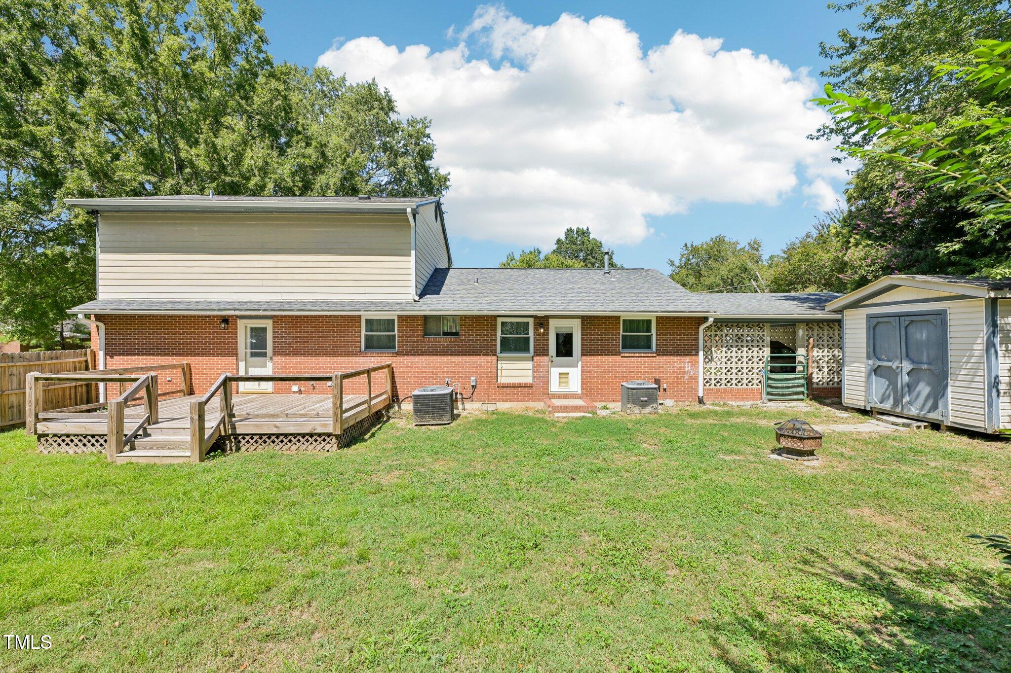 900 Newcombe Road Raleigh, NC 27610 - Photo 23 of 23 front view of a house with a yard