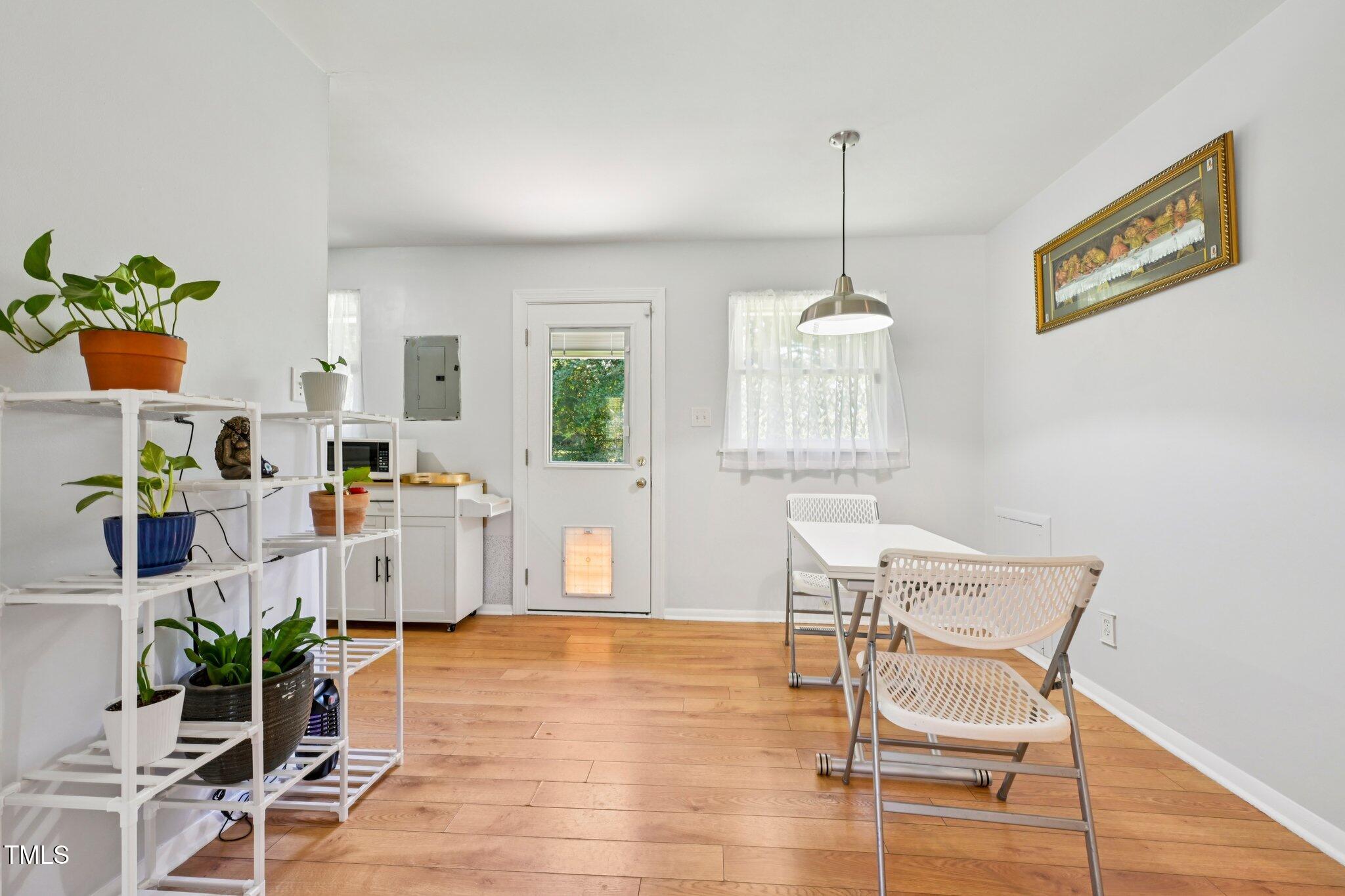 900 Newcombe Road Raleigh, NC 27610 - Photo 7 of 23 a dining room with furniture and window