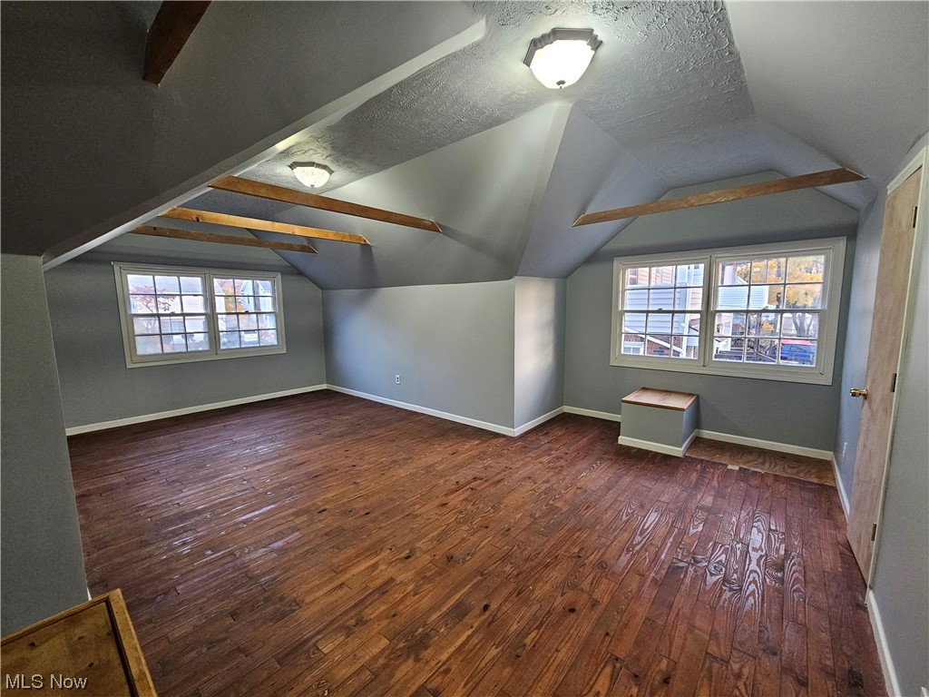 884 Yellowstone Road Cleveland Heights, OH 44121 - Photo 13 of 17 Bonus room featuring dark hardwood / wood-style floors, a wealth of natural light, and lofted ceiling