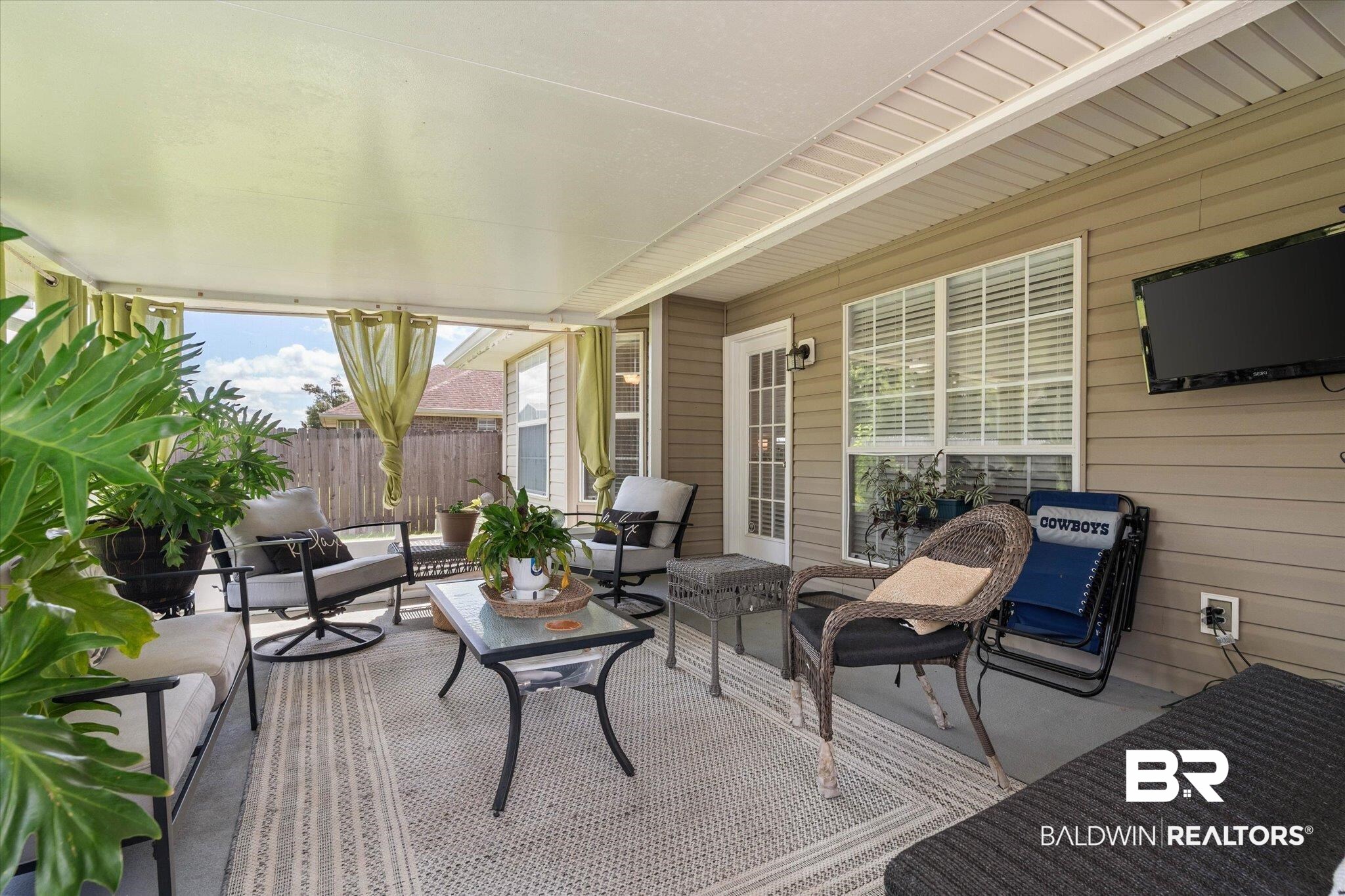 8600 Sable Court Semmes, AL 36575 - Photo 16 of 20 Wooden deck with an outdoor living space