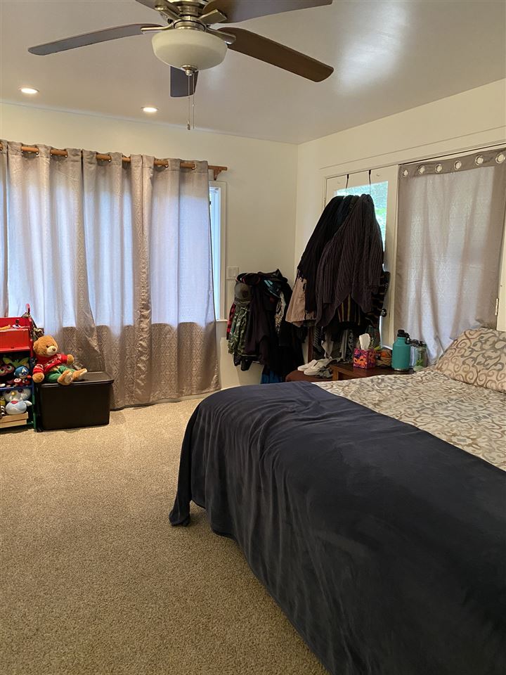 51 Kulalani Circle Kula, HI 96790 - Photo 15 of 30 a bedroom with a bed and a dresser