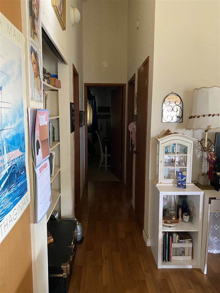 51 Kulalani Circle Kula, HI 96790 - Photo 25 of 30 a view of a hallway with workspace and wooden floor