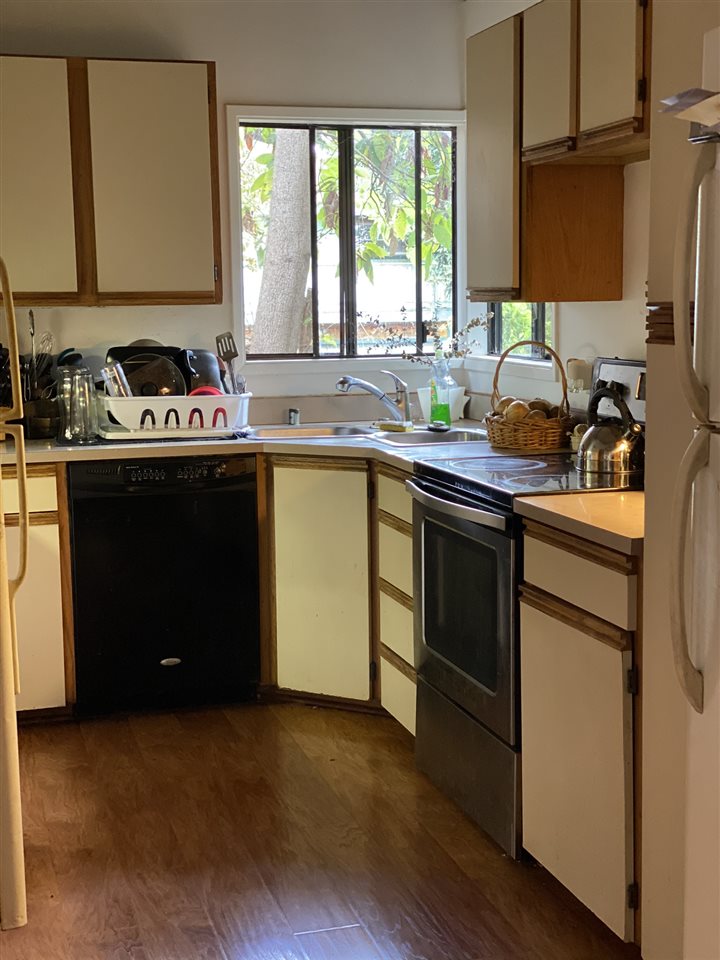 51 Kulalani Circle Kula, HI 96790 - Photo 6 of 30 a kitchen with a sink stove and cabinets