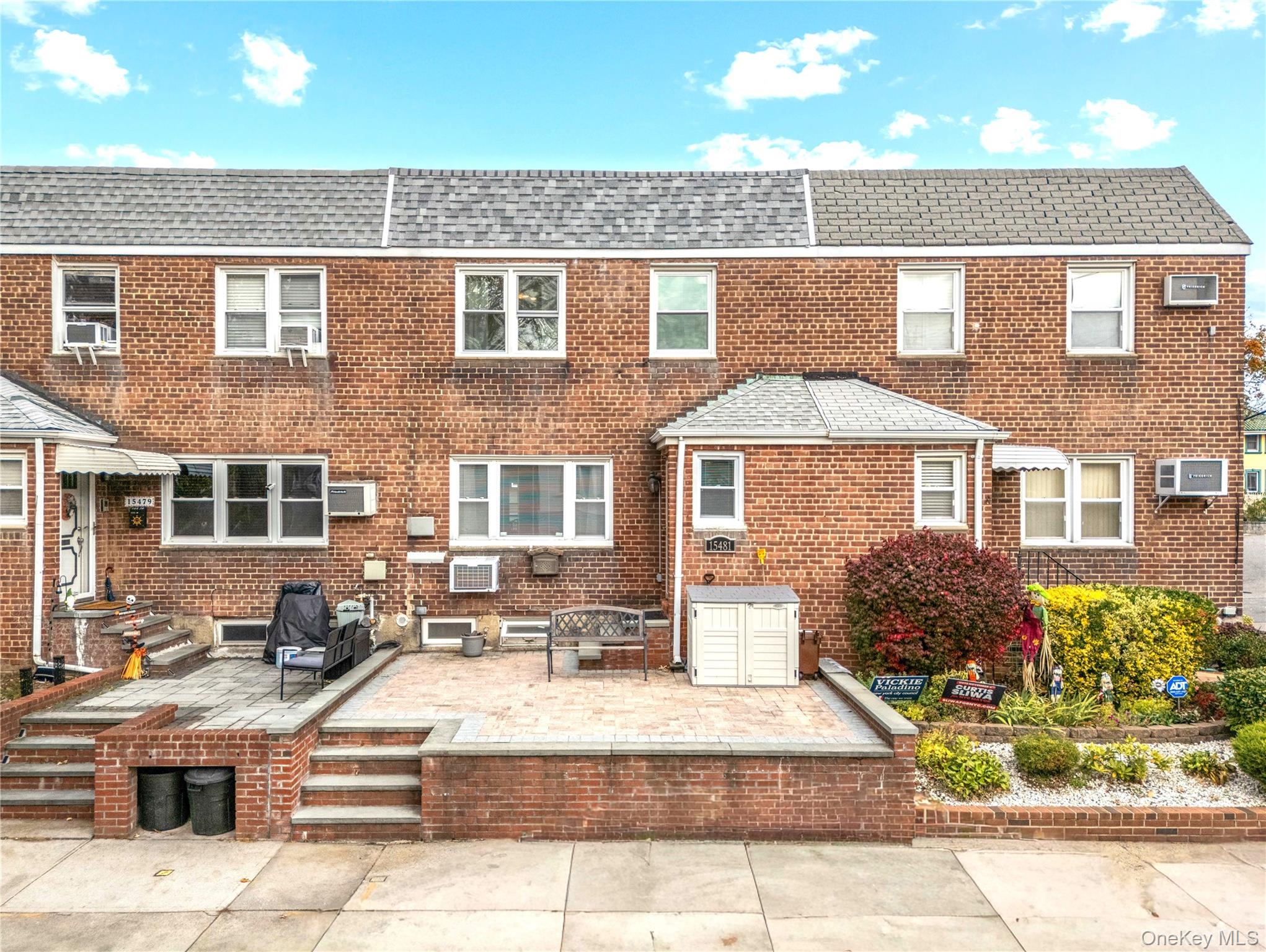 a front view of a house with outdoor space