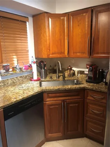 a kitchen with a stove and a microwave