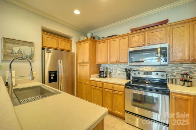 a living room with furniture a rug and a flat screen tv