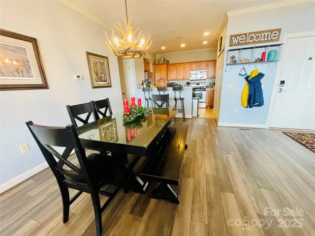 a bathroom with bathtub and a window