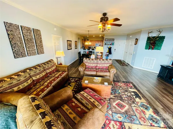 a bathroom with bathtub and a window