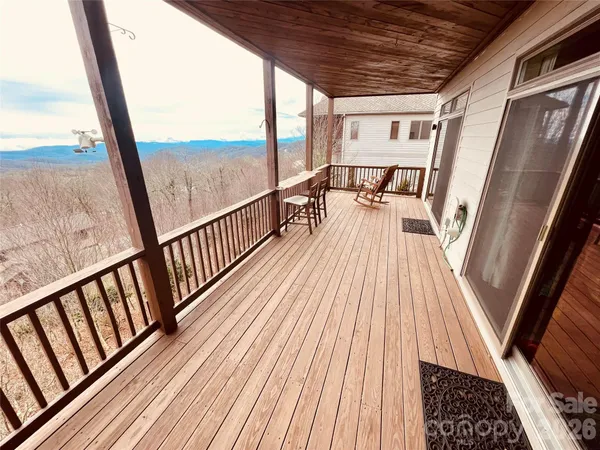 a view of balcony with chairs