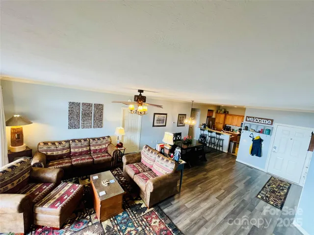 a bedroom with a bed and a flat tv screen