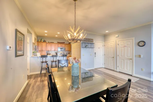 a kitchen with stainless steel appliances a stove sink and cabinets