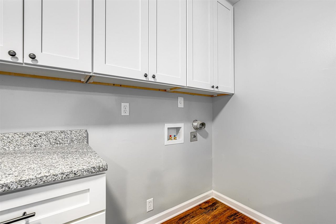 5565 Pleasant View Road, Unit 5565 Memphis, TN 38134 - Photo 17 of 25 a view of a kitchen with white cabinets