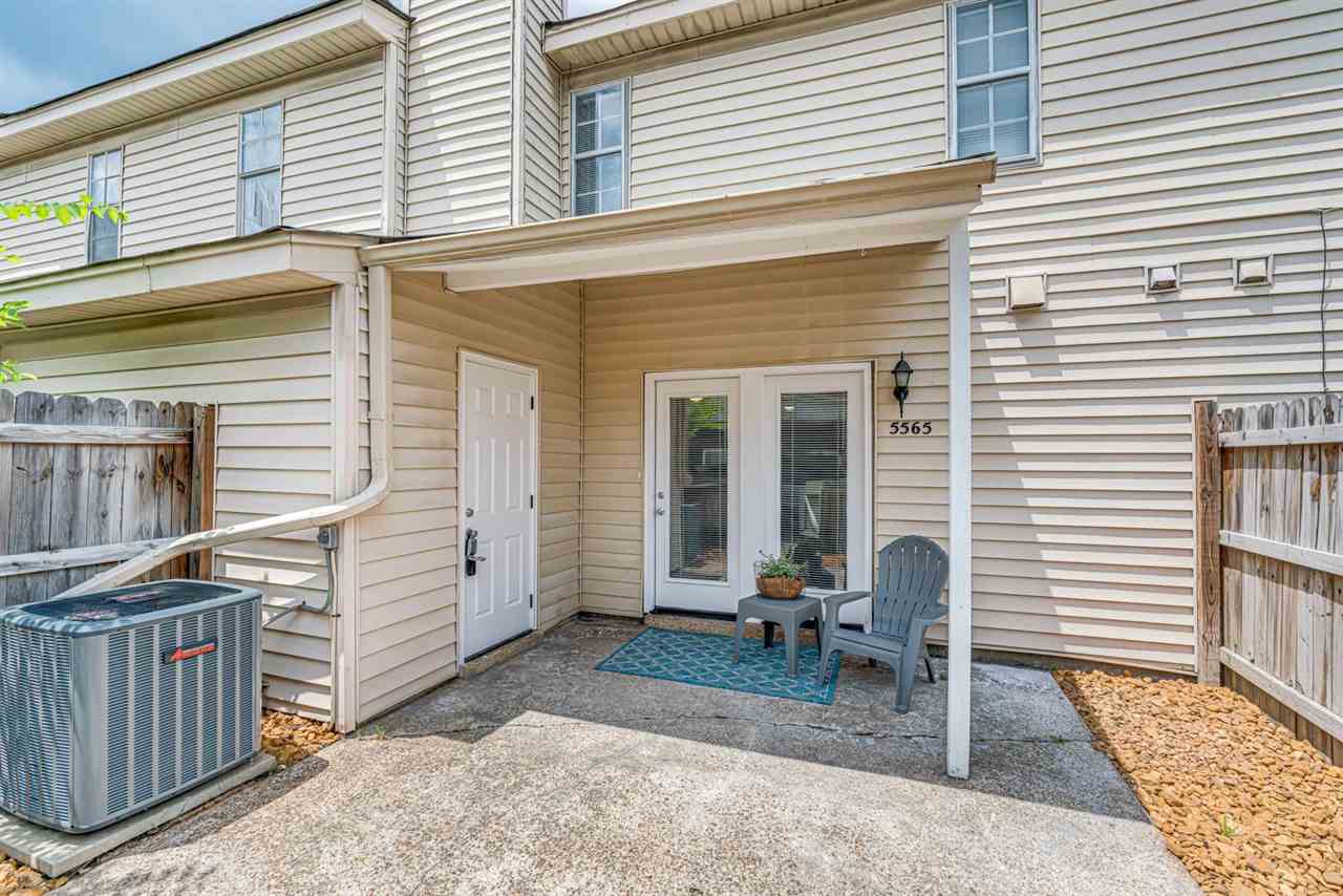 5565 Pleasant View Road, Unit 5565 Memphis, TN 38134 - Photo 21 of 25 a backyard of a house with seating space