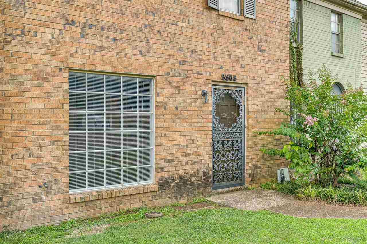 5565 Pleasant View Road, Unit 5565 Memphis, TN 38134 - Photo 24 of 25 a front view of a house with a garden