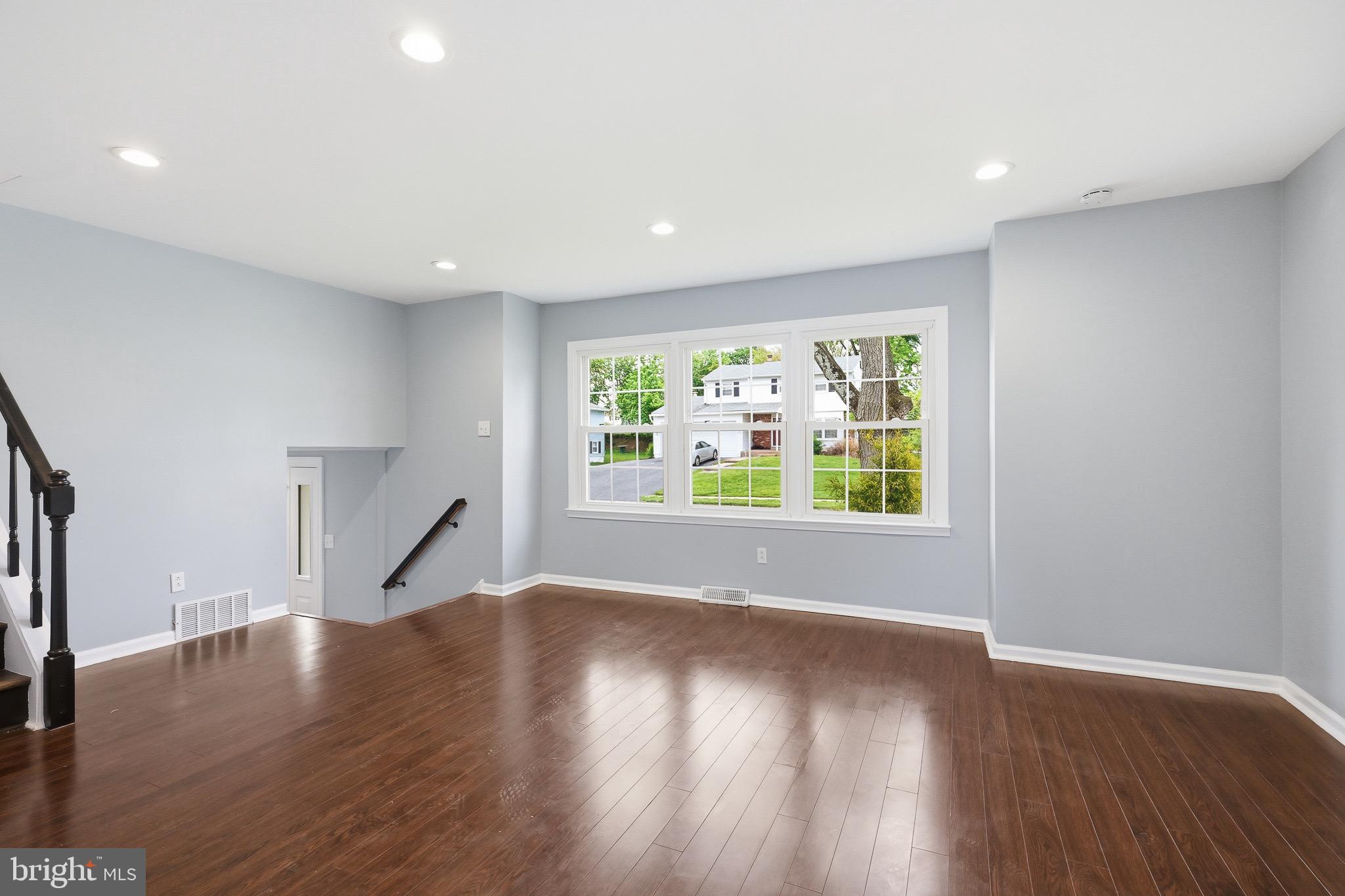4 Pinedale Road Newark, DE 19711 - Photo 6 of 29 a view of wooden floor and windows in a room