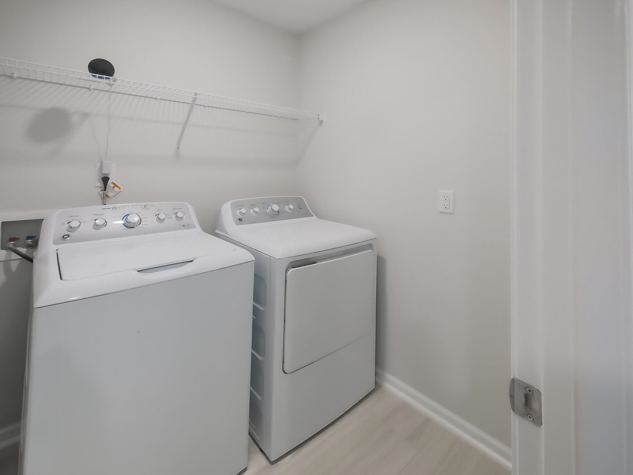1617 Emory Ridge Way Wake Forest, NC 27587 - Photo 19 of 24 a utility room with dryer and washer