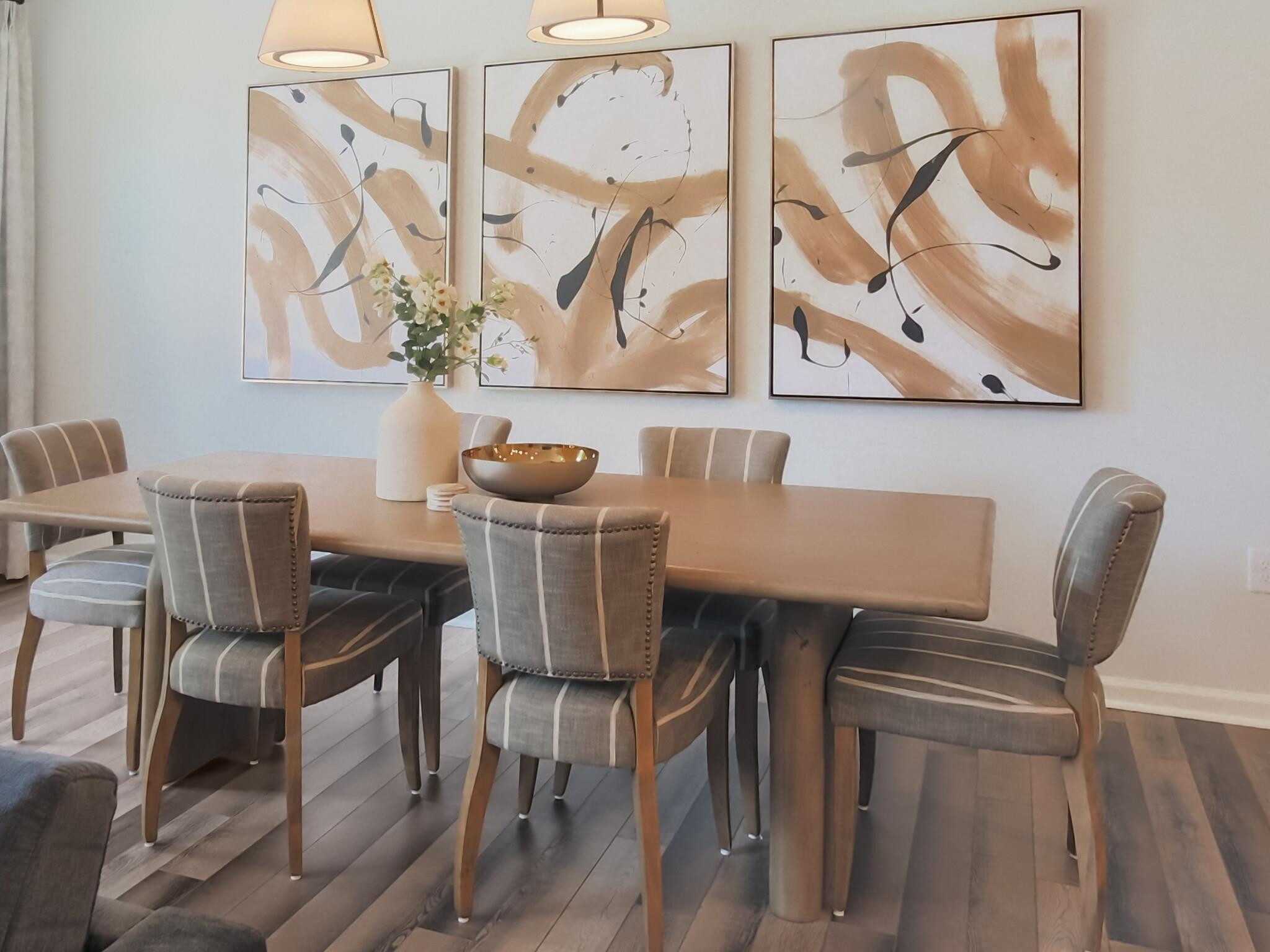 1617 Emory Ridge Way Wake Forest, NC 27587 - Photo 10 of 24 a view of a dining room with furniture and wooden floor